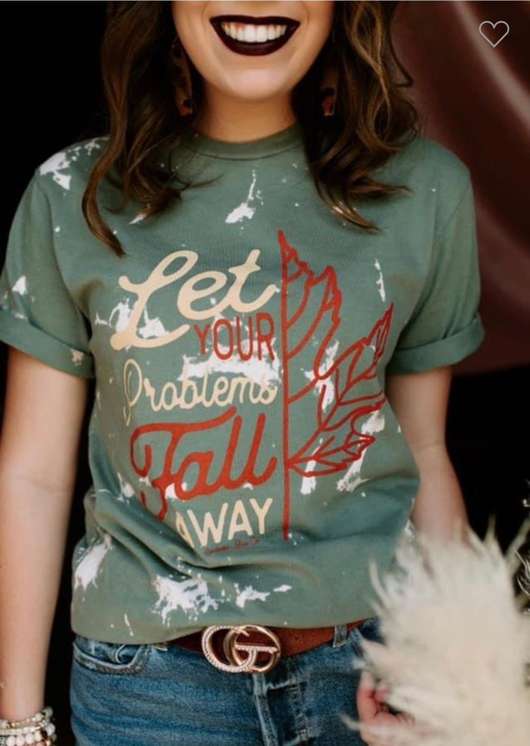 Let your problems fall away graphic tee